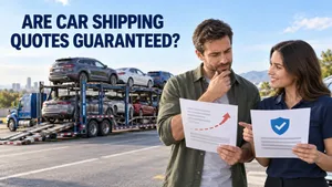 Customer comparing car shipping quote terms beside a professionally loaded open auto carrier.
