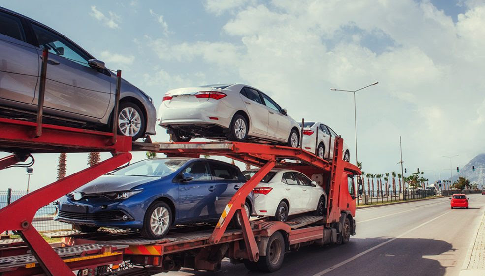 A car carrier truck loaded with new cars