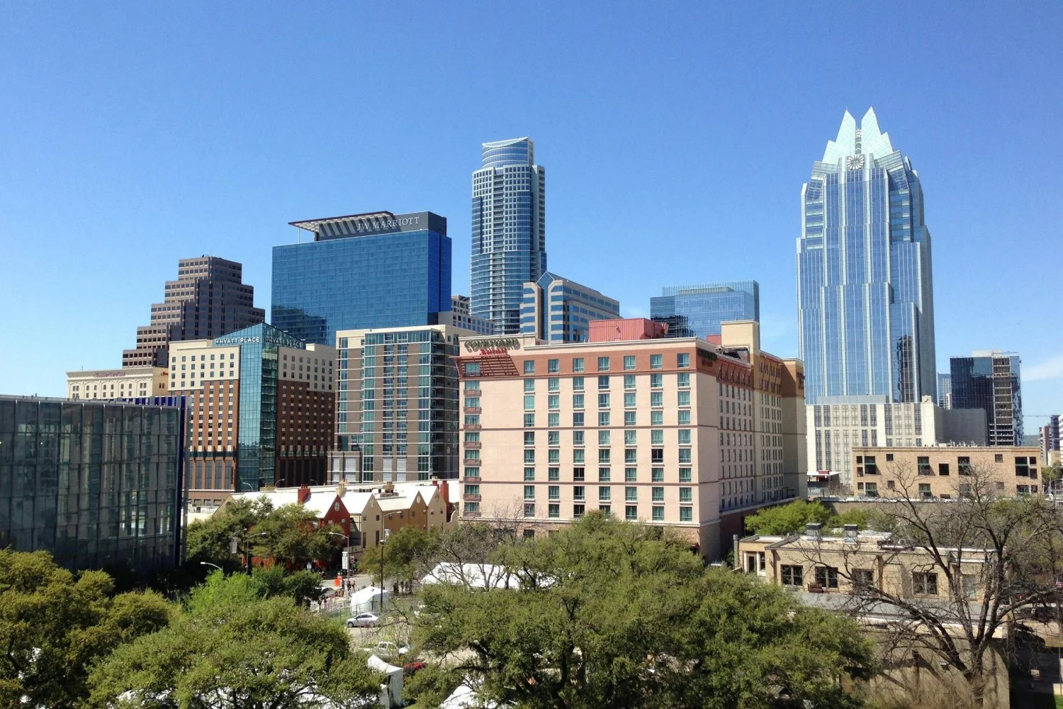 Austin, TX skyline with Bank of America Tower, Renaissance Tower, and Omni Austin Hotel Downtown.