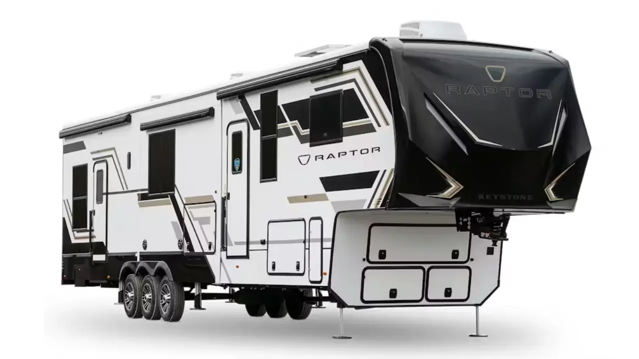 Keystone Raptor toy hauler RV exterior showing rugged design and rear garage area for adventure vehicles.