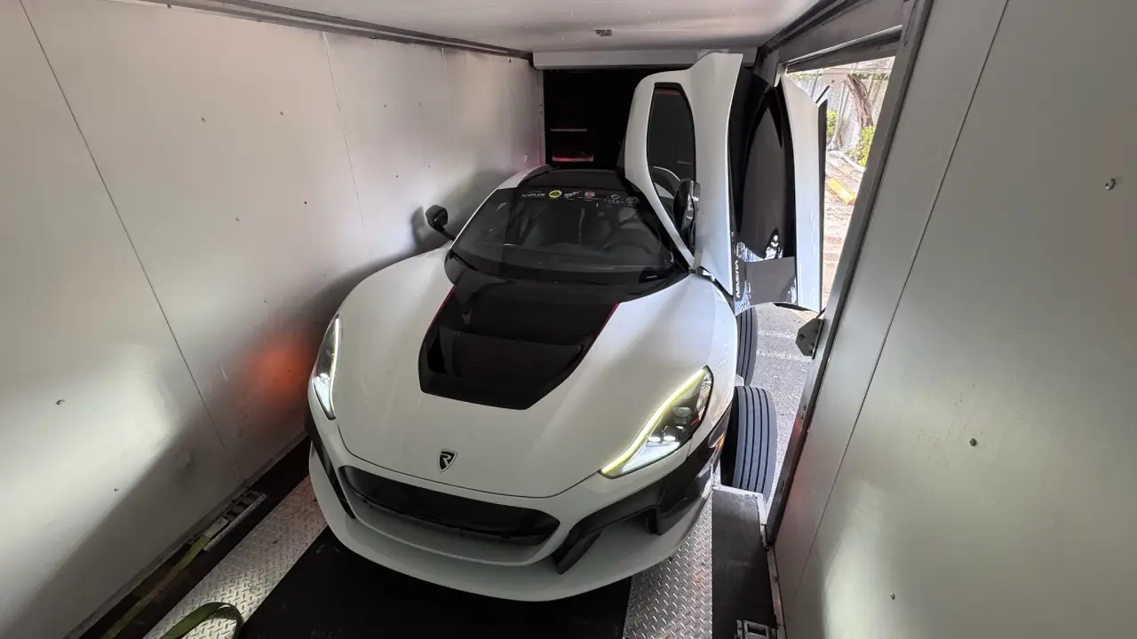 Rimac Nevera Electric Hypercar being loaded into an AutoStar Transport Express trailer.